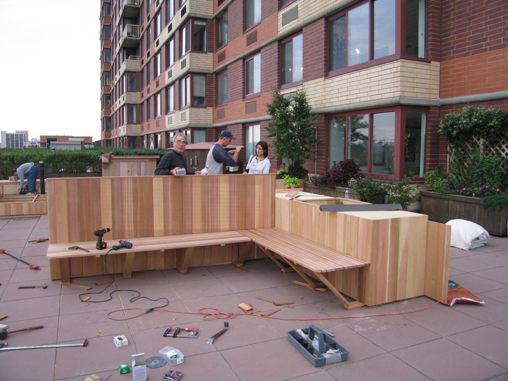 Custom carpenters working on a public terrace in nyc