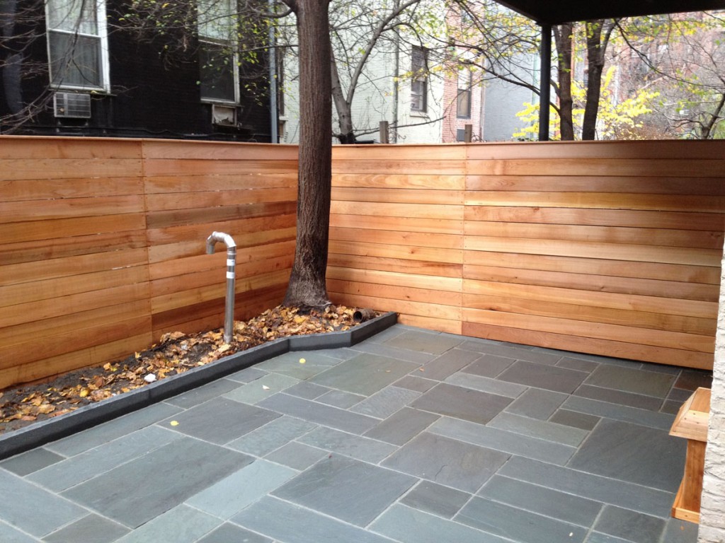 Bluestone patio in Brooklyn with patterned stone pattern